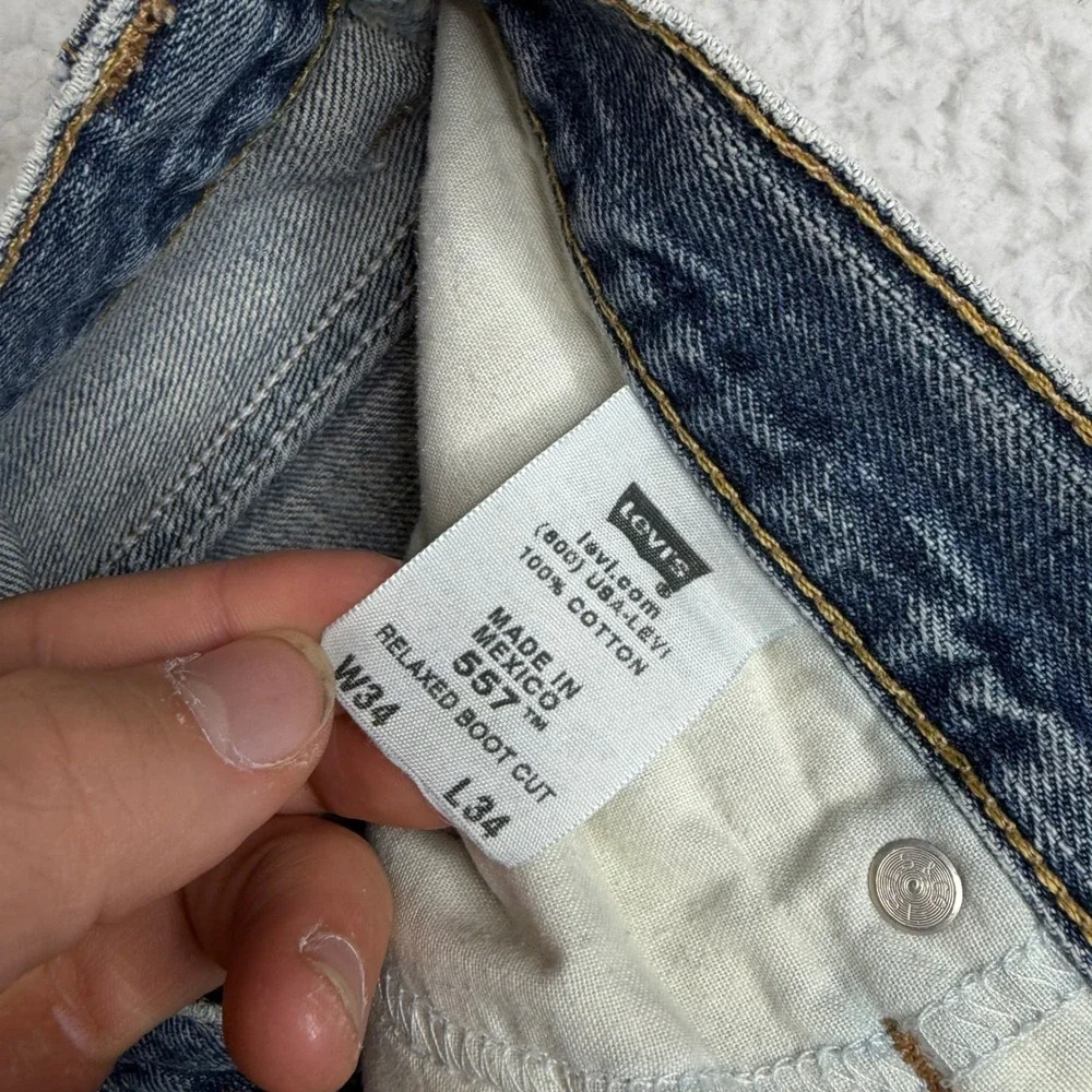 Y2K Levis 557 Relaxed Bootcut Jeans Mens 34x34 Light Wash Distress Denim FADE